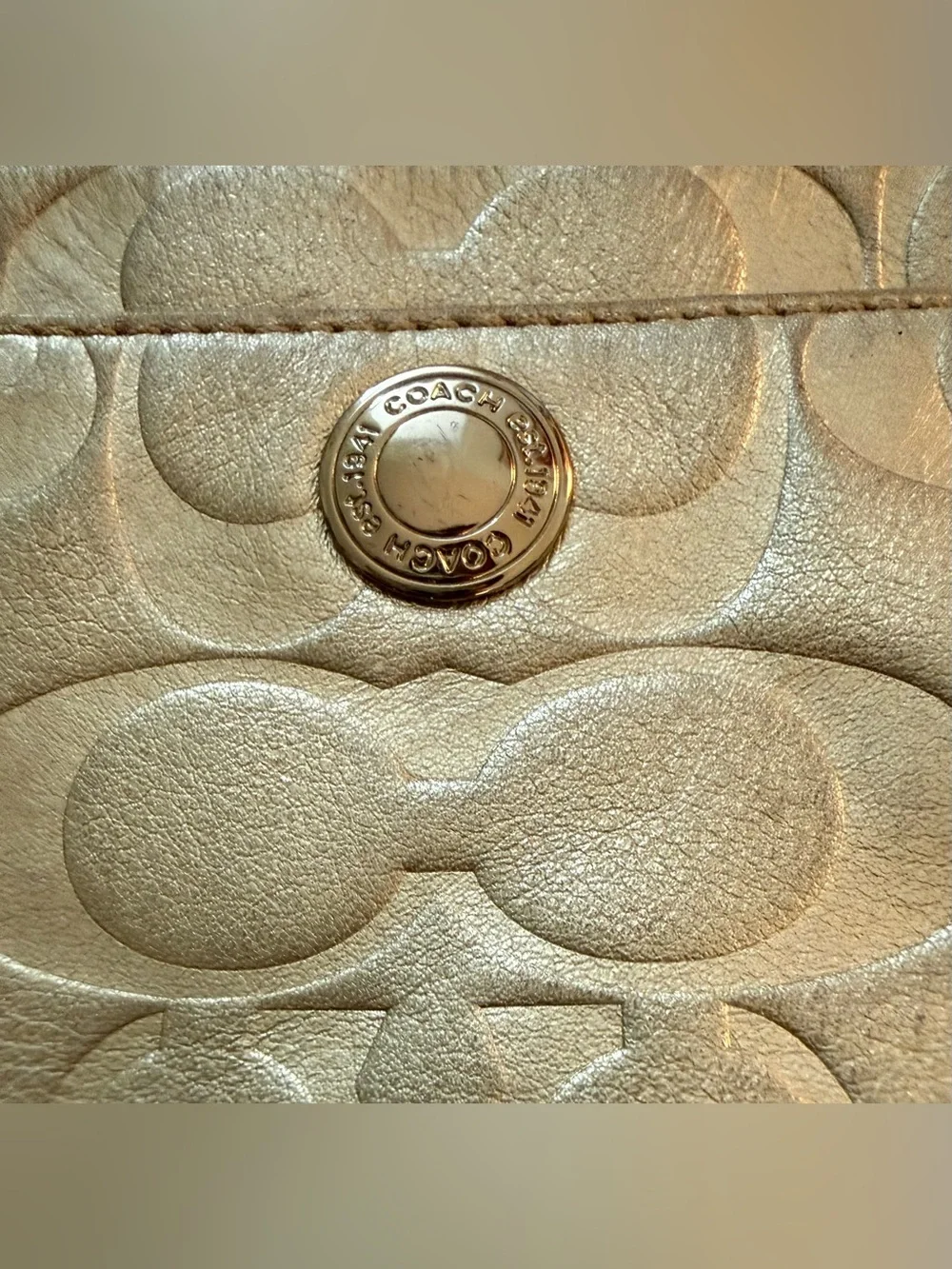Coach metallic gold